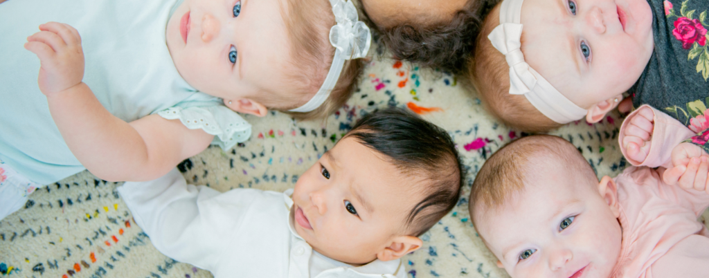 babies in a circle on the carpet